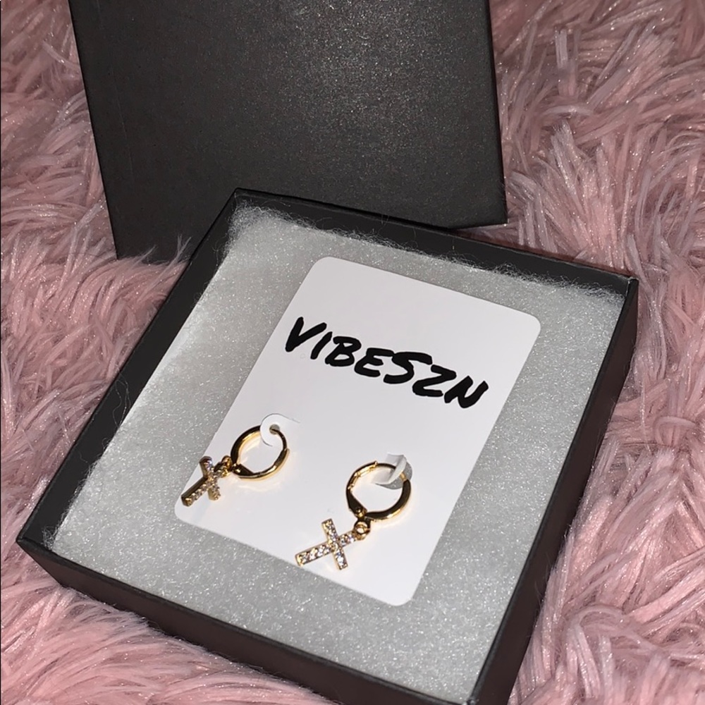 Small gold cross dangling earrings